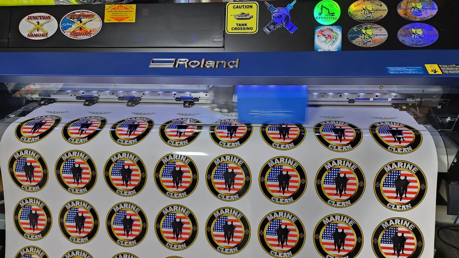 Custom sticker sheets being produced on a printer