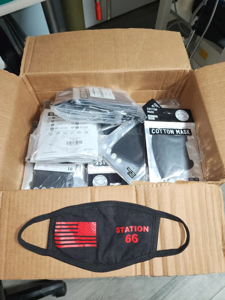 Branded tote bags prepared for a custom promotional order